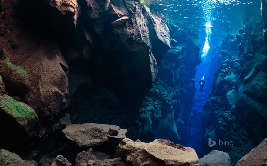 Diver in the Silfra, Thingvellir Lake, Thingvellir National Park, Iceland