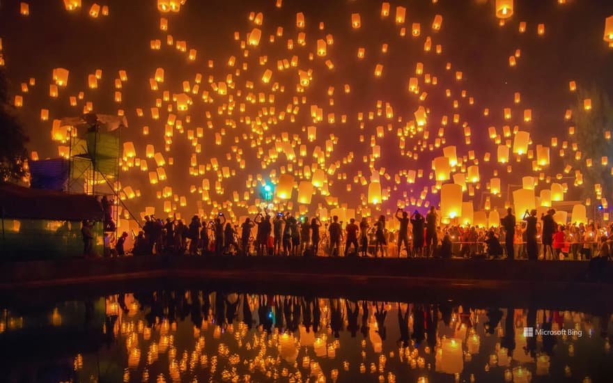 Sky lanterns take flight during the Yi Peng Festival in Chiang Mai, Thailand